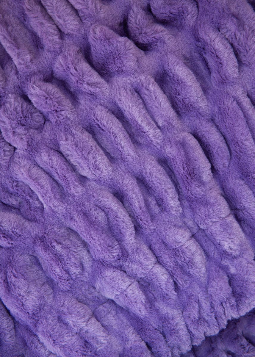Vibrant purple stretchy blanket with a ruched texture. 